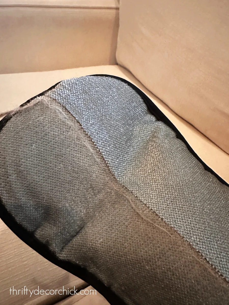 rolled up fur on pet glove